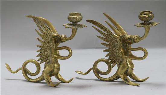 A pair of brass candlesticks